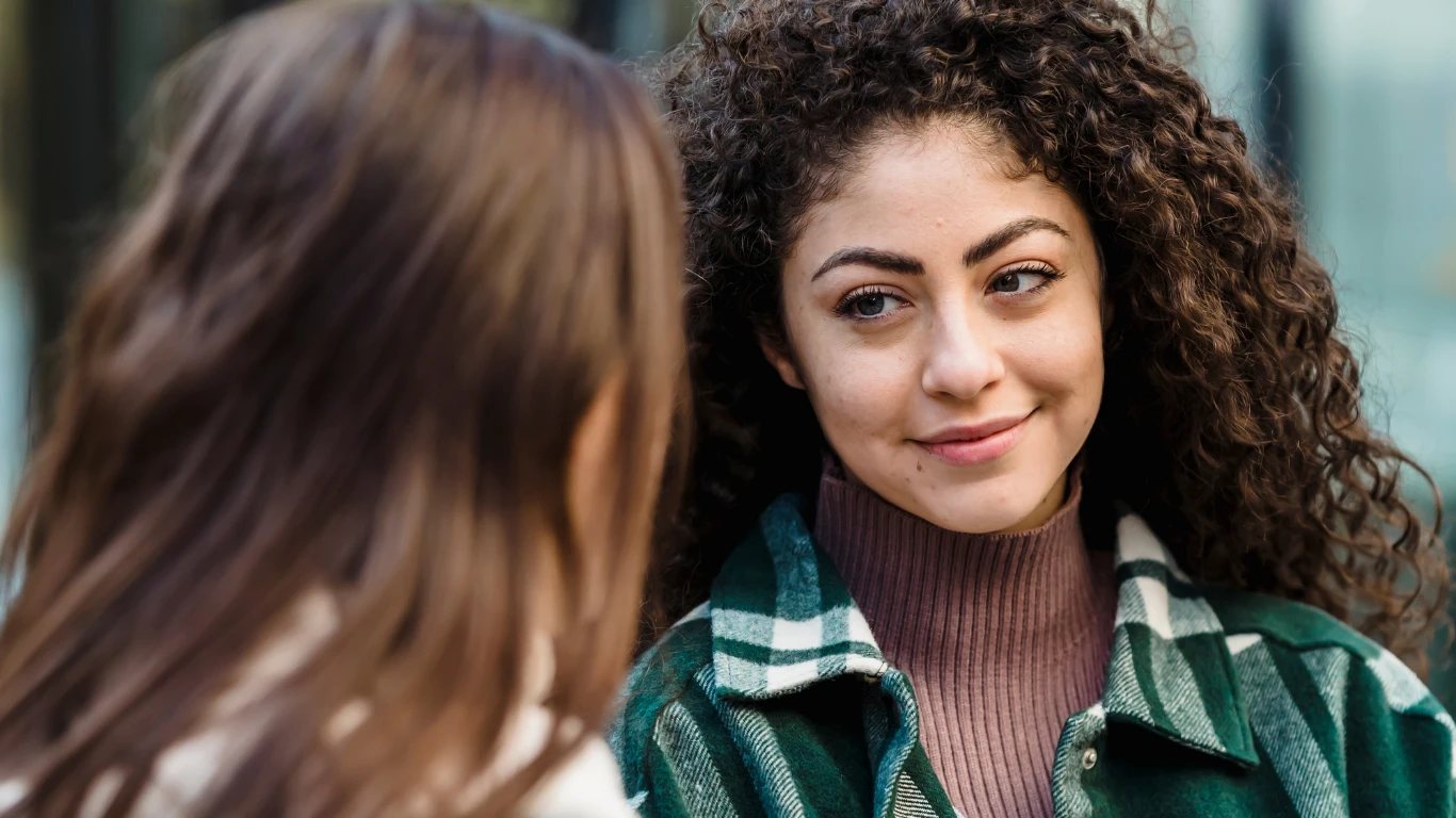 Two friends in conversation